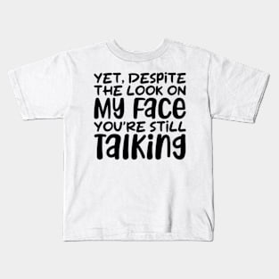 yet despite the look on my face you're still talking Kids T-Shirt